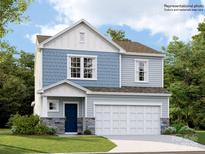 Charming two-story home features a combination of blue siding and stone accents for added curb appeal at 4415 Dusty Orchard Rd, Kannapolis, NC 28081