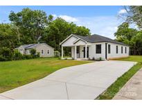 Charming renovated home with a large driveway and beautiful yard at 1016 Confederate S Ave, Rock Hill, SC 29732
