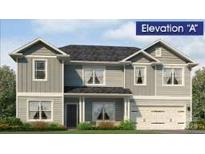 New construction shows an exterior elevation of a two-story home with a front-facing garage and covered porch at 118 Kerr Walk Dr # 17, Statesville, NC 28677