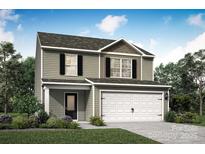 Charming two-story home featuring a covered porch, two-car garage, and classic architectural details at 1508 Doran Ter, Richburg, SC 29729
