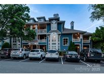 Beautiful multi-level condominium building with private balconies and ample parking spaces at 623 Olmsted Park Pl # D, Charlotte, NC 28203