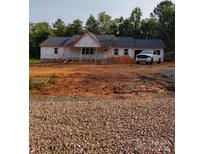 Charming single-story home showcasing a new roof and bright windows under construction at 2021 Dogwood Trl, Shelby, NC 28150