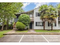 Charming two-story condo with landscaped yard and convenient parking at 1638 Hunters Trl, Rock Hill, SC 29732