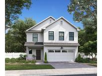 Charming two-story home with white siding, black windows, and attached two car garage at 733 Oak St, Charlotte, NC 28214