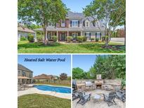 Beautiful home with a well-maintained lawn and a variety of outdoor amenities at 113 Dairy Farm Rd, Mooresville, NC 28115