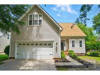 Charming home with well-maintained landscaping, attached garage, and inviting entrance at 3912 Grace Ct, Indian Trail, NC 28079