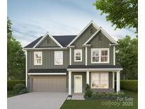New construction home featuring a two-car garage, neutral color palette, and professionally landscaped front yard at 1811 Country Club Rd, Lincolnton, NC 28092