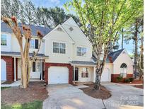Charming townhome with a well-maintained lawn and attached garage in a desirable neighborhood at 5953 Prescott Ct # 3105, Charlotte, NC 28269