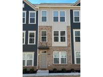Charming townhome with brick facade and inviting entryway, perfect for modern living at 3007 Citizens Ln, Charlotte, NC 28205