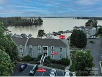 Waterfront condo boasts deeded boat slip, assigned parking, and gorgeous water views at 20417 Harborgate Ct # 510, Cornelius, NC 28031