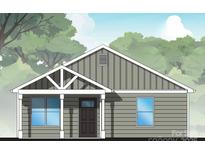 Charming single-story home with gray siding, white trim, a covered porch, and a well-manicured lawn at 2116A Glenwood St, Kannapolis, NC 28083