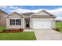 Charming single-story home with manicured lawn, neutral siding, and attached two-car garage at 4607 Harris Elliot Rd, Lincolnton, NC 28092
