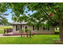 Charming home with a covered porch and lush green lawn at 103A N Tracy St, Kings Mountain, NC 28086