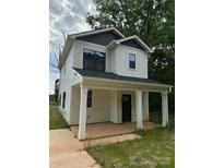 Charming two-story home featuring a welcoming front porch with white columns and a modern color scheme at 760 3Rd Street Sw Pl, Hickory, NC 28602