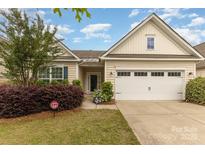 Charming single-story home with landscaped yard, attached garage and security system at 527 Livingston Dr, Lancaster, SC 29720