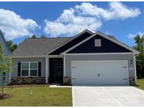 Charming single-Gathering home with a well-manicured lawn and a two-car garage at 1522 Doran Ter, Richburg, SC 29729