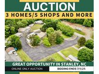 Aerial view of an auction property featuring multiple homes and shops in Stanley, NC with a bidding deadline of July 1, 2025 at 1733 S Nc 16 Business Hwy, Stanley, NC 28164