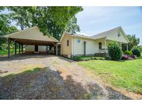 Charming home with a covered carport and well-maintained lawn at 7660 Bud Davis Rd, Vale, NC 28168