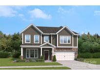 Charming two-story home with a stone-accented garage and a beautifully landscaped front yard at 308 Balboa St, Matthews, NC 28104