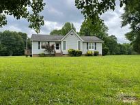 Charming single-story home with a well-maintained front yard and inviting curb appeal at 4317 Waxhaw Indian Trail Rd, Indian Trail, NC 28079
