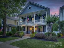 Charming two-story home featuring double porches and professional landscaping at 628 Bracket St, Fort Mill, SC 29708
