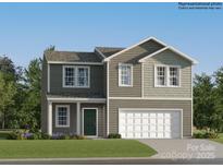 Charming two-story home with a well-manicured lawn and an attached two-car garage at 6361 Fairfax Ct, Maiden, NC 28650