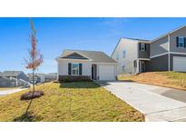 Charming single-story home featuring a one-car garage and well-manicured lawn at 4677 Fanning Rd, Hickory, NC 28602