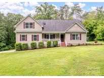 Charming home featuring a well-maintained lawn and inviting front porch perfect for relaxing at 5369 Concord Rd, York, SC 29745