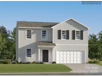 Charming two-story home featuring a two-car garage and classic architectural details at 6337 Fairfax Ct, Maiden, NC 28650