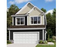 Charming two-story home featuring a two-car garage and a mix of siding and shake shingle architectural design at 760 Kitfox Nw Dr, Concord, NC 28027