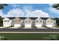 New townhome community features diverse exteriors, private garages, and landscaped front yards at 1237 Margo Mannor Dr, Fort Mill, SC 29708
