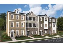 Charming new construction townhome featuring brick and siding exterior and well-manicured front yard at 1940 Westerhill Dr, Fort Mill, SC 29708