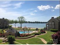 Beautiful pool view with beach access and gazebo near the lake at 635 Portside Dr, Davidson, NC 28036