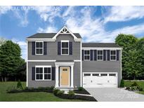Two-story home featuring gray siding, a yellow front door, and a well-manicured lawn at 12013 Beaux Art Ln, Charlotte, NC 28214