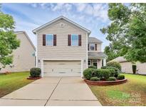 Charming two-story home featuring a two-car garage and well-maintained landscaping at 13407 Morgan Lee Ave, Charlotte, NC 28213