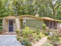 Charming single story home with a welcoming front entrance and beautifully landscaped front yard at 157 Old Hearth Rd, Clover, SC 29710
