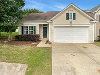 Charming single-Gathering home with a well-manicured lawn, attached garage, and inviting curb appeal at 3436 Ibis Ln, Fort Mill, SC 29707