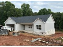 Charming single story home with light gray siding, a dark roof, and a brick foundation awaiting completion at 63 Cornerstone Dr, Taylorsville, NC 28681