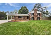 Charming two-story brick home with black shutters and a well-maintained front yard at 1224 Bethlehem Rd, Kings Mountain, NC 28086