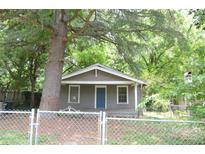 Charming single-story home featuring a blue front door and inviting curb appeal at 1216 Mountain Ave, Gastonia, NC 28052