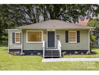 Charming single-story home featuring a landscaped front yard and welcoming entrance at 2819 Georgia Ave, Charlotte, NC 28205