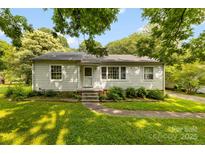 Charming one-story home with a well-maintained lawn and inviting front entrance at 505 Franklin Ave, Shelby, NC 28150