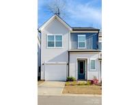 Charming two-story home with a light gray exterior, blue accent, and a one-car garage, offering curb appeal at 9142 Widden Way, Charlotte, NC 28269