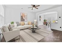 Bright living room with modern decor, stylish furnishings, and an open concept design at 3153 Bending Birch Pl, Charlotte, NC 28206