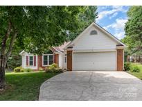 Charming single-Gathering home with a two-car garage and a well-maintained lawn at 137 Citation Dr, Mooresville, NC 28117