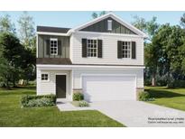 Charming two-story home with a two-car garage, landscaped yard, and classic architectural details at 2118 Columbidae Ln, Gastonia, NC 28052