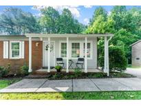 Close-up of the home's inviting front porch and facade at 106 Valley Rd, York, SC 29745