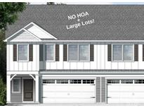 A two-story townhome with white siding, dark shutters, and two-car garage, offering curb appeal at 12526 Susanna Dr, Charlotte, NC 28214