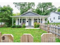 Charming single-story home featuring a covered front porch and a well-maintained front yard with a picket fence at 812 Kings Rd, Shelby, NC 28150