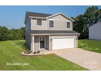 Charming two-story home features a front-entry two car garage, manicured lawn and welcoming front porch at 823 32Nd Ne St, Conover, NC 28613